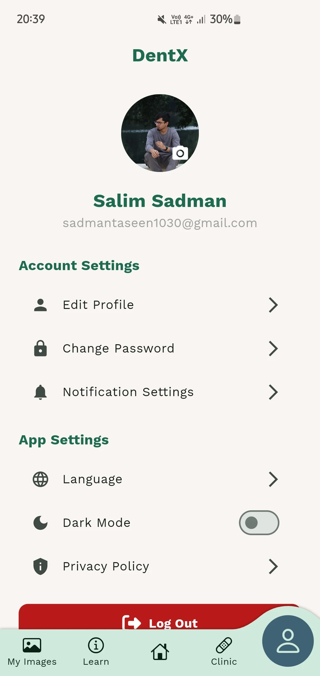 Profile screen with account settings, language, dark mode and privacy policy options.